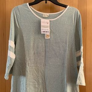 Green and white T-shirt.